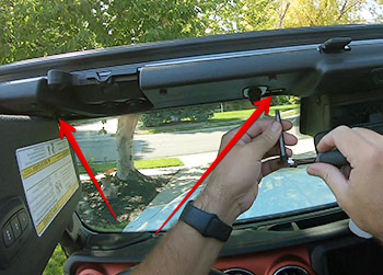 Removing the torx bolt to lower the windshield of the Jeep Wrangler JL