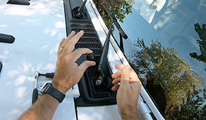 Lowering Windshield on a Jeep Wrangler JL windshield wiper bolt cap